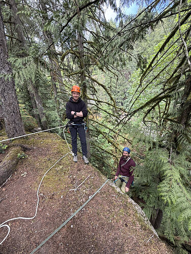 Ben (left) set up on a static line to observe and supervise Tyler’s (right) anchor building and rappel transition.