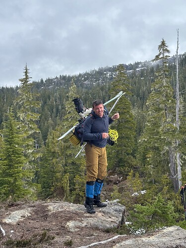 Skier with heavy pack on (NE)