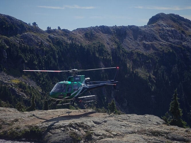 Heli landing at the hut. Not a good place for a tent today.